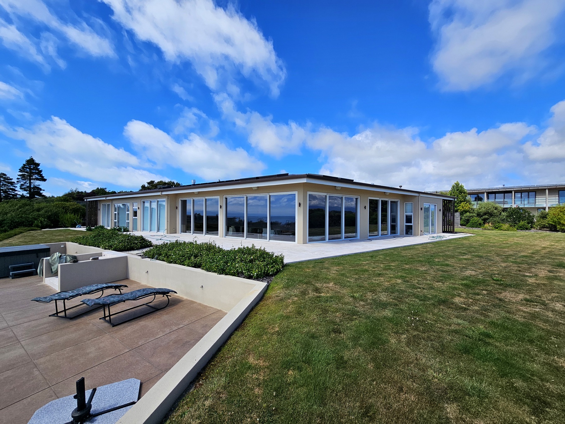 A modern single-storey home in Motueka under a blue sky