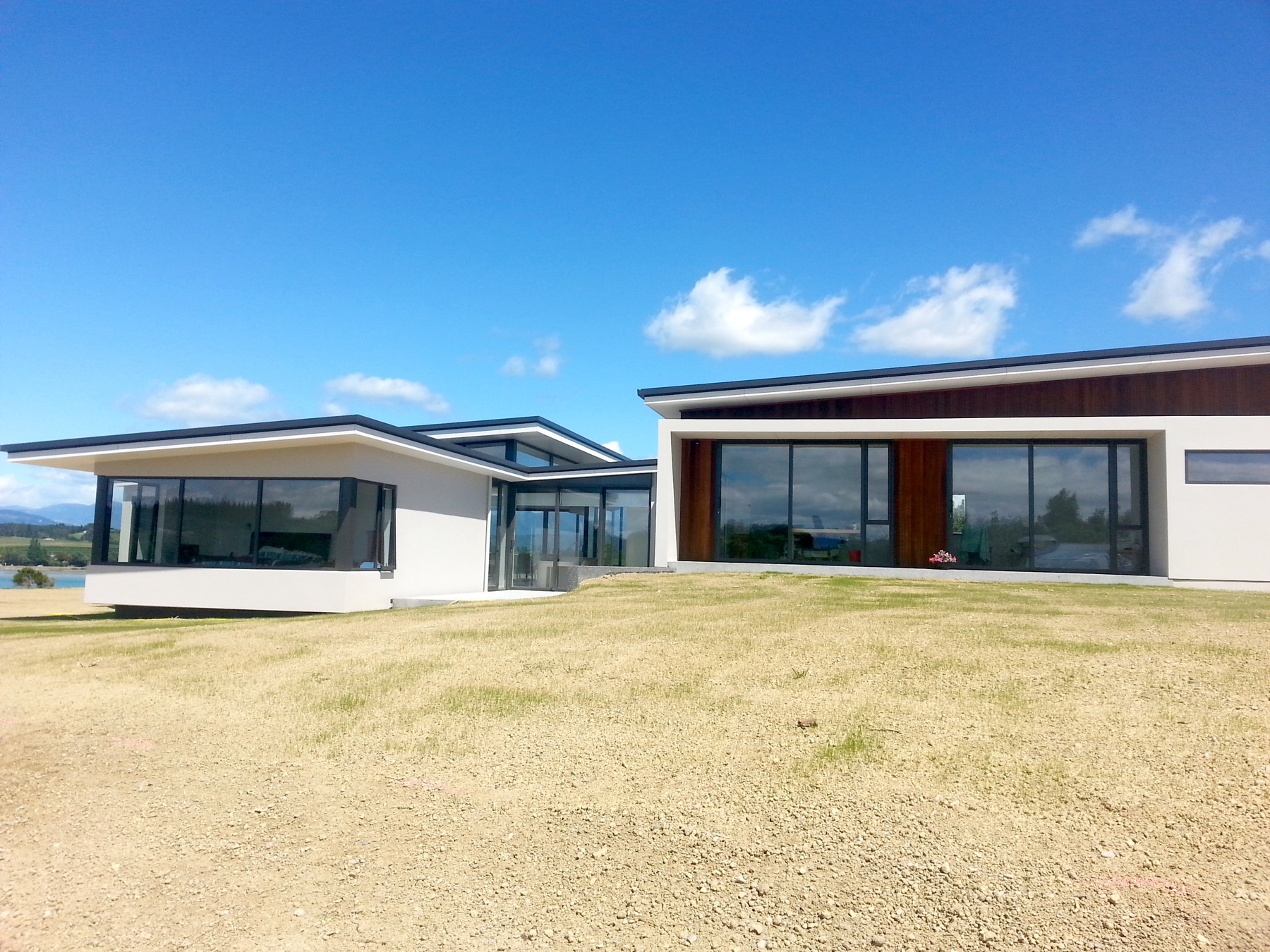 A Nelson home with a low roofline, timber accents and big windows